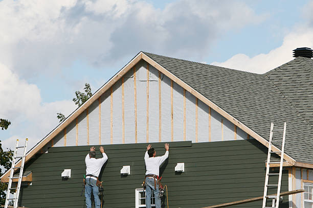 Professional Storm Damage Siding Repair technician working in Hampton, MD
